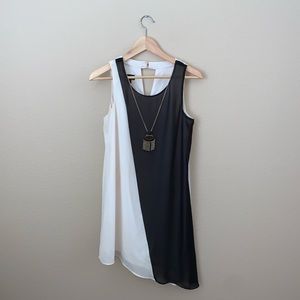 Asymmetrical dress that’s creme and black